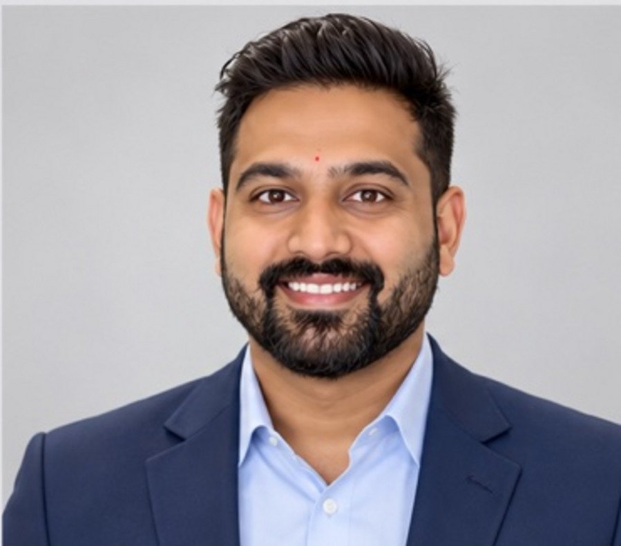 Visa Rayudu AI brand character in a navy suit